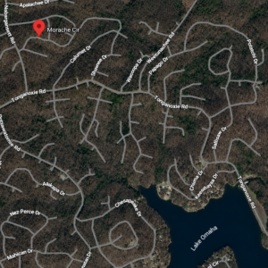 Discover an enticing Arkansas & Walk to the lake! 1 Acre residential lot nestled near the serene shores of Lake Omaha, perfectly primed for constructing your dream home or placing a charming mobile home. Cherokee Village- Utilities at the property and road frontage: APN: 235-14976-000