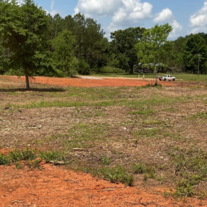 Discover a fantastic opportunity with this 1.3- surveyed acre residential property located in the charming town of Luverne, Alabama. This spacious lot comes equipped with essential utilities, including power and water, ensuring a hassle-free setup for your future home. With convenient road access, you’ll enjoy easy transportation and accessibility. Whether you envision a cozy mobile home or a custom-built residence, this move-in-ready property is the perfect canvas for your dream home!