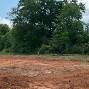 Discover a fantastic opportunity with this 1.3- surveyed acre residential property located in the charming town of Luverne, Alabama. This spacious lot comes equipped with essential utilities, including power and water, ensuring a hassle-free setup for your future home. With convenient road access, you’ll enjoy easy transportation and accessibility. Whether you envision a cozy mobile home or a custom-built residence, this move-in-ready property is the perfect canvas for your dream home!