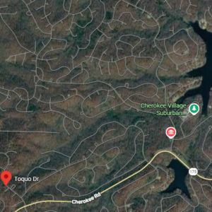 1 Acre Lot -Walk to the golf course!  Arkansas Property residential lot nestled near the serene shores of Lake Omaha, perfectly primed for constructing your dream home or placing a charming mobile home. Cherokee Village- Utilities at the property and road frontage: APN: 200-13838-000