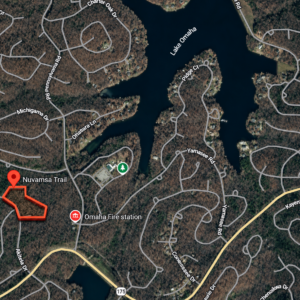 1 acre residential lot nestled near Hwy 175 and the serene shores of Lake Omaha, perfectly primed for constructing your dream home or placing a charming mobile home. Cherokee Village- Utilities at the property and road frontage: APN: 270-16380-000