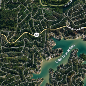 Discover an enticing Arkansas Residential Lot  & Walk to the Lake Thunderbird -A residential lot nestled near the serene shores of Lake Omaha, perfectly primed for constructing your dream home or placing a charming mobile home. Cherokee Village- Utilities at the property and road frontage: APN: 335-18623-000
