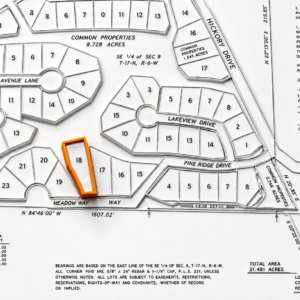 1.34 acre residential lot nestled near Hwy 175 and the serene shores of Lake Omaha, perfectly primed for constructing your dream home or placing a charming mobile home. Cherokee Village- Utilities at the property and road frontage: APN: 390-20828-000