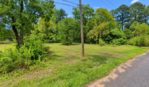 Residential Lot with mobile home on it in Ouachita County offers power, water and sewer in a relaxed South Arkansas lifestyle with a mix of small-town communities, wooded scenery, river access, and lower-density living. APN: 939-00029-000R